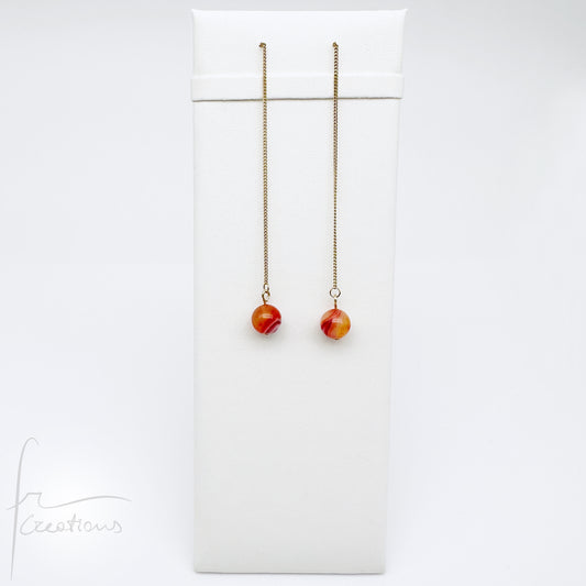 Mono orecchini pendenti saliscendi con agata striata ruby