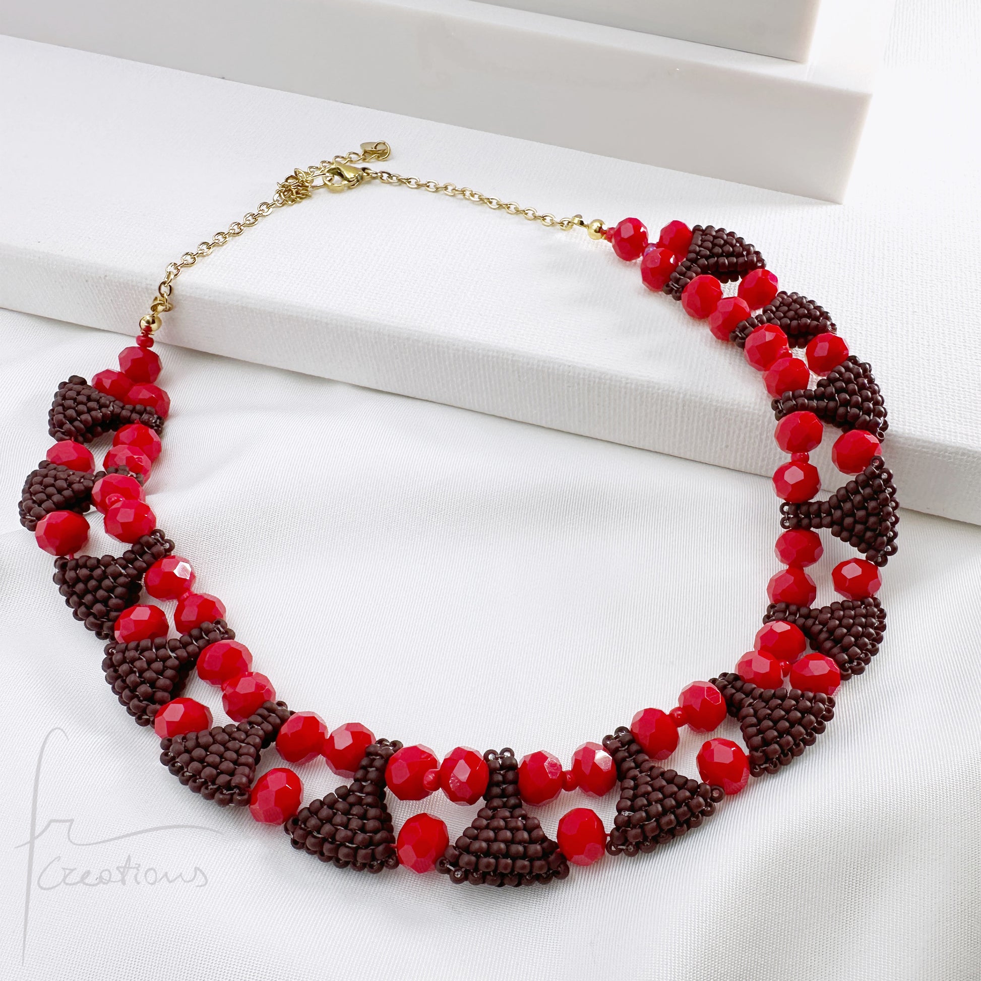 Collana girocollo in tessitura con cristalli e perline Maya